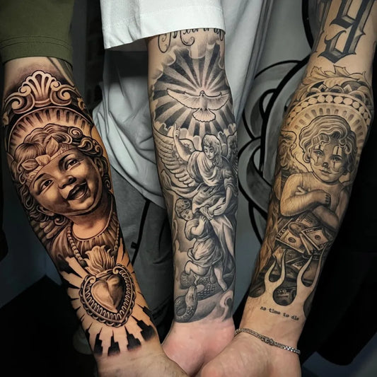 Big Chicano Cherub Angel Heart Tattoo on Men Arm by @yuripetrucci