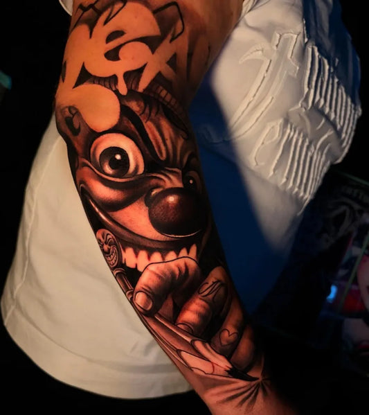 Big Chicano Graffiti Clown Tattoo on Men Arm by @a.s_tattoo90