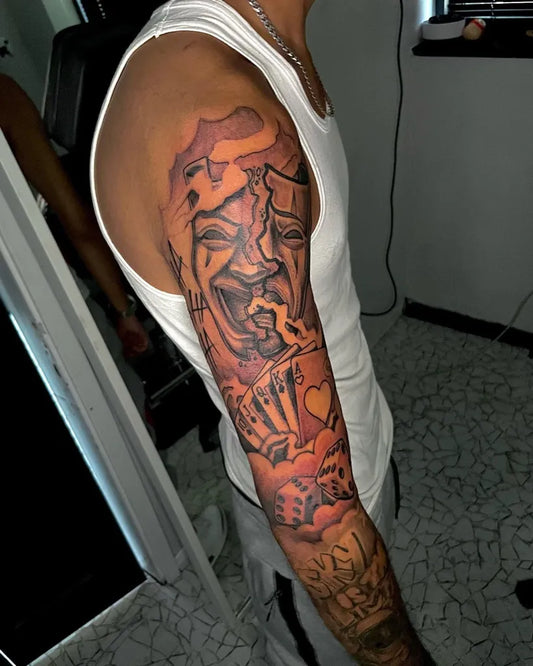 Big Chicano Theater Mask and Heart Tattoo on Men Upper Arm by @inkinremz