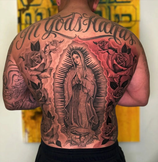 Big Chicano Virgin of Guadalupe with Roses and Banner Tattoo on Men Back by @jr_nunez