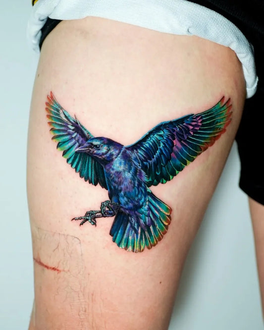 Big Color Blue Raven on Women Thigh Tattoo by @non_lee_ink
