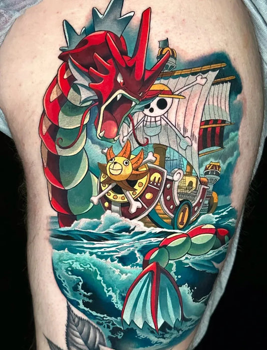 Big Color Pokemon and Ship Tattoo on Men Arm by @chynnajade.tattoos