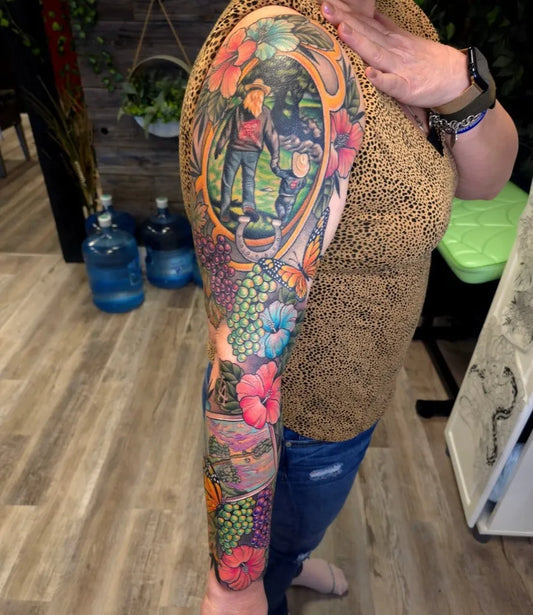 Big Color Realism Grapes and Flowers Tattoo on Women Upper Arm by @taylormarieart