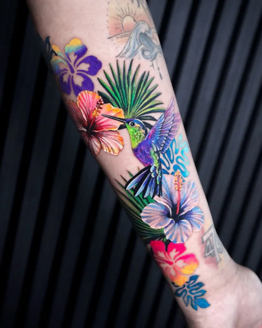 Big Color Realism Hummingbird Flowers Palm on Women Arm Tattoo by @mimique_tattoo
