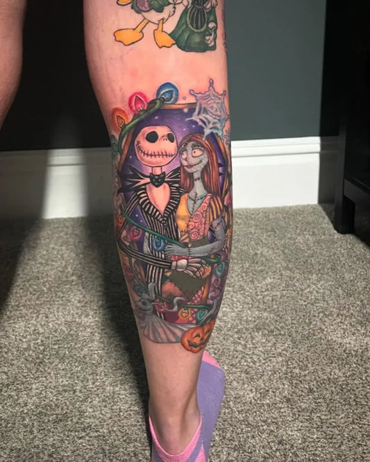 Big Color Realism Jack and Sally Tattoo on Women Calf by @inkbyhannah