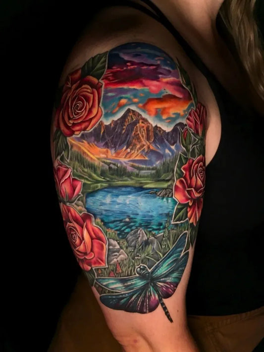 Big Color Realism Mountain Rose Dragonfly Tattoo on Women Arm by @ray.tattooer