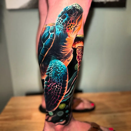Big Color Realism Sea Turtle Tattoo on Women Thigh by @seangilberttattoos
