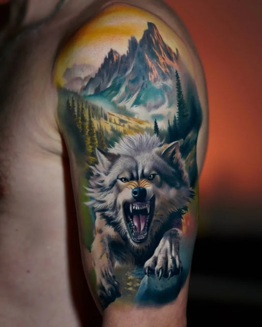 Big Color Realism Wolf Mountain Landscape on Men Arm Tattoo by @lytstattoo