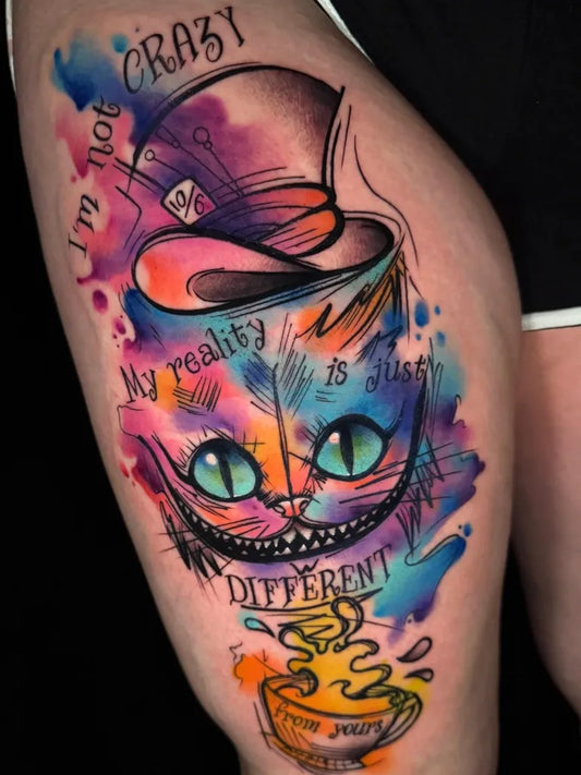 Big Colorful Cheshire Cat Tattoo on Women Thigh by @tattooregikat