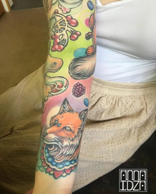 Big Colorful Fox Berries Tattoo on Women Arm by @annai.anima