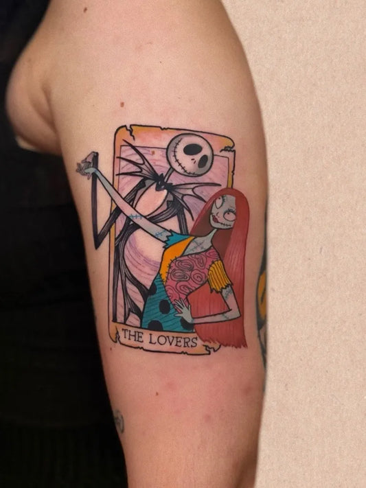Big Colorful Jack Skelly and Sally as Lovers Tarot Tattoo on Women Arm by @mstraditionaltattoo