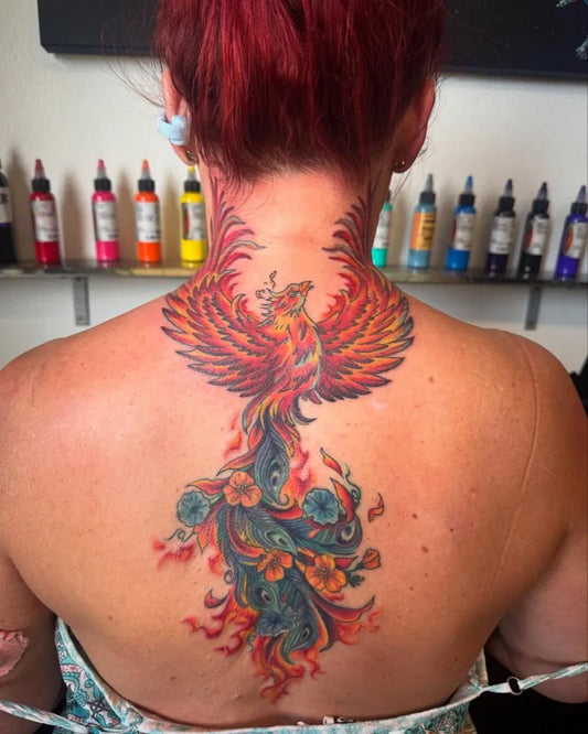 Big Colorful Phoenix on Women Back Tattoo by @madisun.art