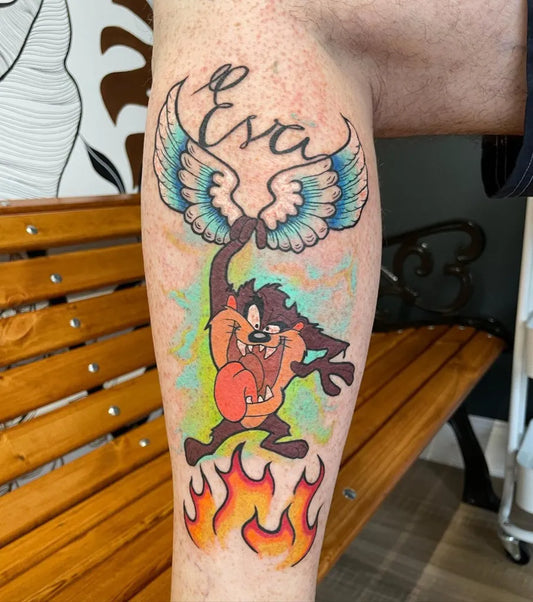Big Colorful Taz with Wings and Flames Tattoo on Men Leg by @maxpetar