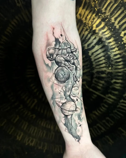 Big Cosmic Astronaut and Planets on Men Forearm Tattoo by @inksmithtattooclonmel_official