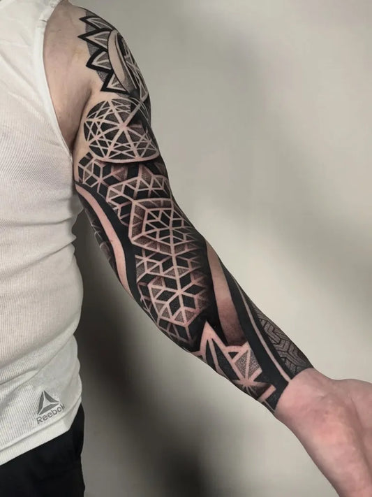 Big Dotwork Geometric Sleeve Tattoo on Men Arm by @mitchin.tattoos