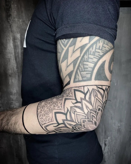 Big Dotwork Geometric Tribal Tattoo on Men Upper Arm by @rowenas.tattoo.art