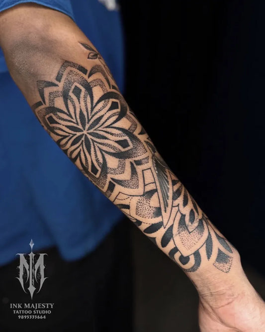 Big Dotwork Mandala Flower Tattoo on Men Arm by @tattoo_ink_majesty_taliparamba