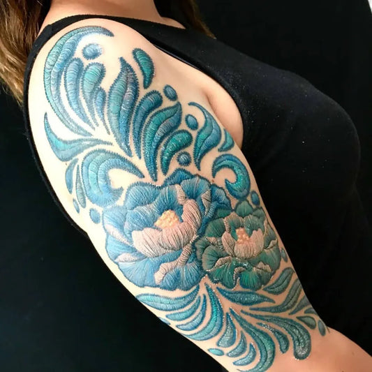 Big Embroidery Blue Flowers and Foliage Tattoo on Women Shoulder by @muthalovevintage