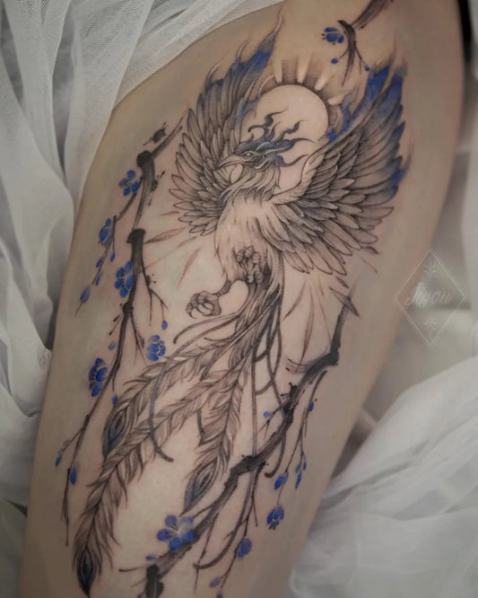 Big Fantasy Phoenix and Cherry Blossom on Women Thigh Tattoo by @jiy.u_ink