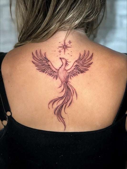 Big Fantasy Phoenix and Stars on Women Back Tattoo by @tama_diamonddog