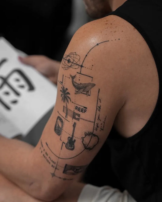 Big Fine Line Abstract Geometric Composition with Whale and Guitar on Men Upper Arm Tattoo by @temir.hagmet.ink