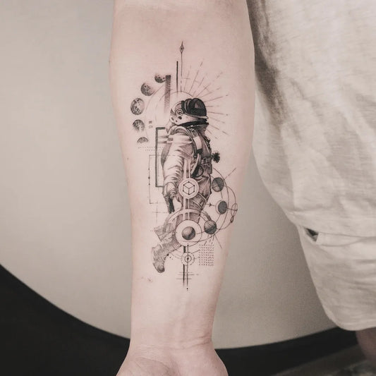 Big Fine Line Astronaut Planets Geometric Shapes on Men Forearm Tattoo by @ruhwan_tattooer