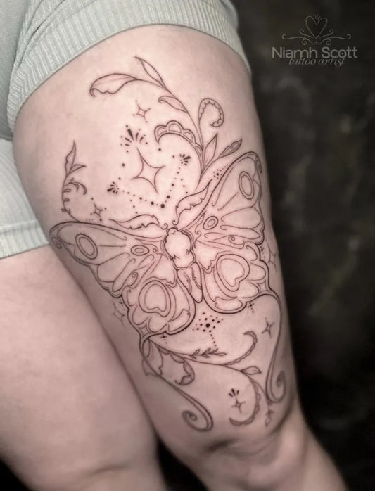 Big Fine Line Butterfly and Vines on Women Thigh Tattoo by @niamh_tattoo
