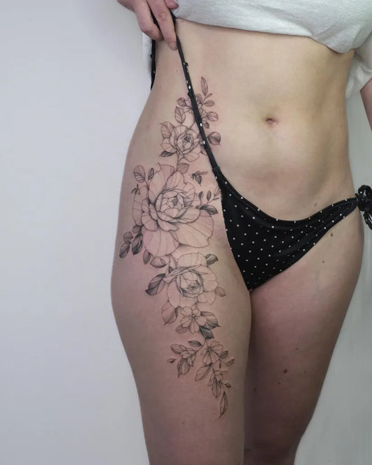 Big Fine Line Floral Vines Tattoo on Women Hip by @joe.thefloraltattooist
