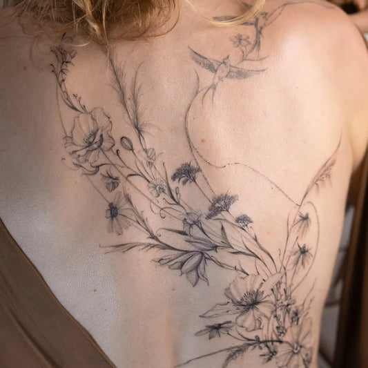 Big Fine Line Flowers and Birds on Women Back Tattoo by @olejnik.tattoo