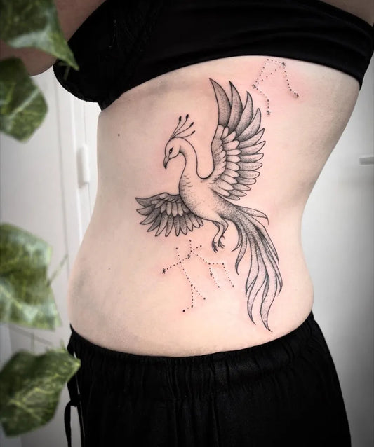 Big Fine Line Phoenix and Constellations on Women Rib Tattoo by @so__tattoo