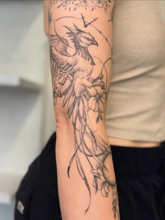 Big Fine Line Phoenix and Flowers on Women Arm Tattoo by @peterharren