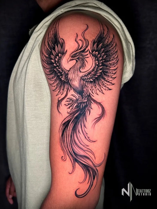 Big Fine Line Phoenix on Men Shoulder Tattoo by @nn_tattoo_studio
