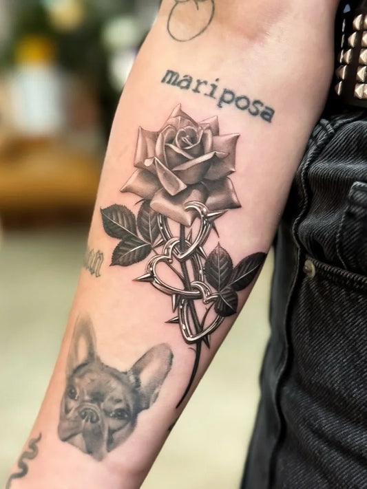 Big Fine Line Rose with Thorns and French Bulldog on Women Arm Tattoo by @nicotattoo.nyc