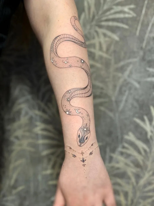 Big Fine Line Snake and Stars on Women Arm Tattoo by @allyxink