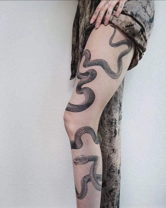 Big Fine Line Snake on Women Leg Tattoo by @covenant.lisboa