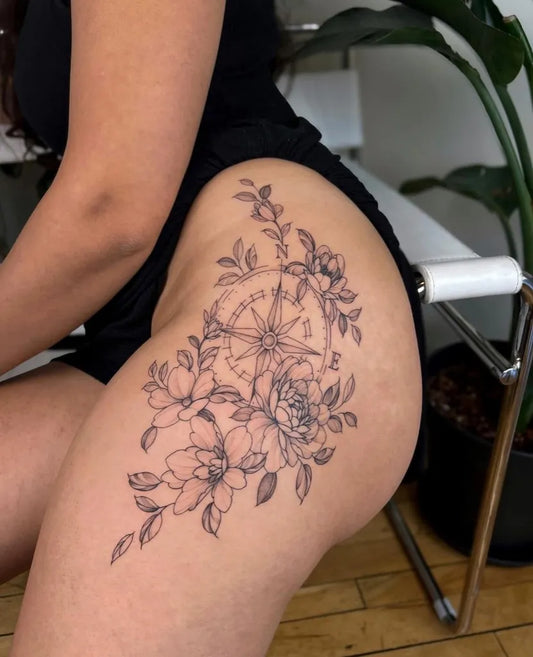 Big FineLine Compass and Roses on Women Hip Tattoo by @pink.ink.studios