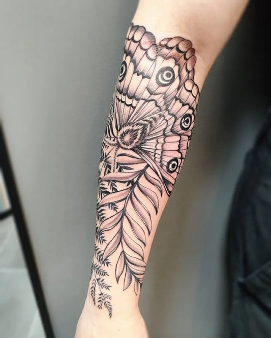 Big FineLine Moth and Ferns on Women Forearm Tattoo by @steelninkstudios