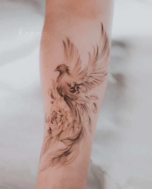 Big FineLine Phoenix and Rose on Women Arm Tattoo by @karolinaszymanska_tattoo