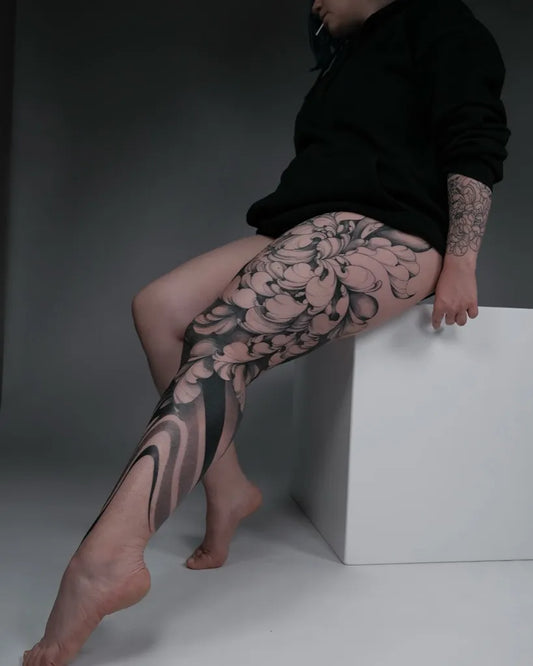 Big Floral Blackwork Thigh on Women Leg Tattoo by @lenaburlai.ink