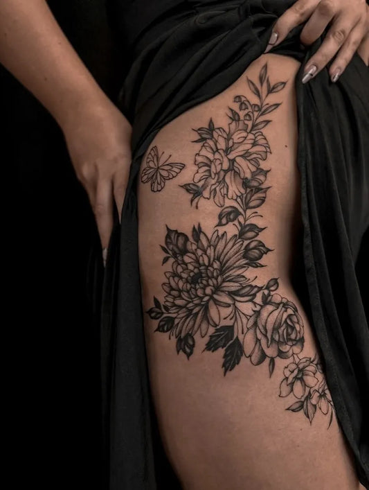 Big Floral Botanical Butterfly on Women Thigh Tattoo by @vean_tattoo_wolverhampton