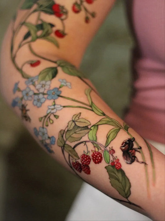 Big Floral Botanical Strawberry Raspberry Forget Me Not on Women Arm Flower Tattoo by @vanessa.core