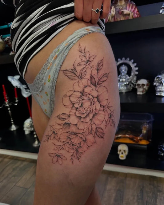 Big Floral Bouquet on Women Thigh Tattoo by @lotpot_tattoo