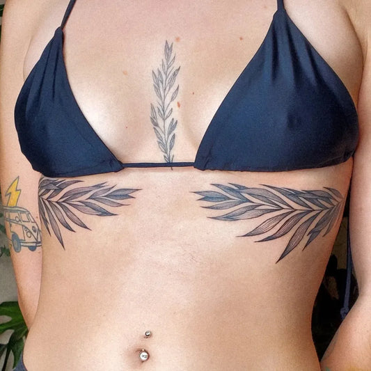 Big Floral Leaves on Women Sternum Tattoo by @miaceleste.design