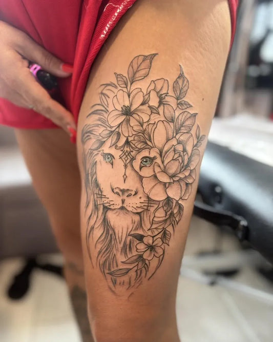 Big Floral Lioness on Women Thigh Tattoo by @chapelhillstudio