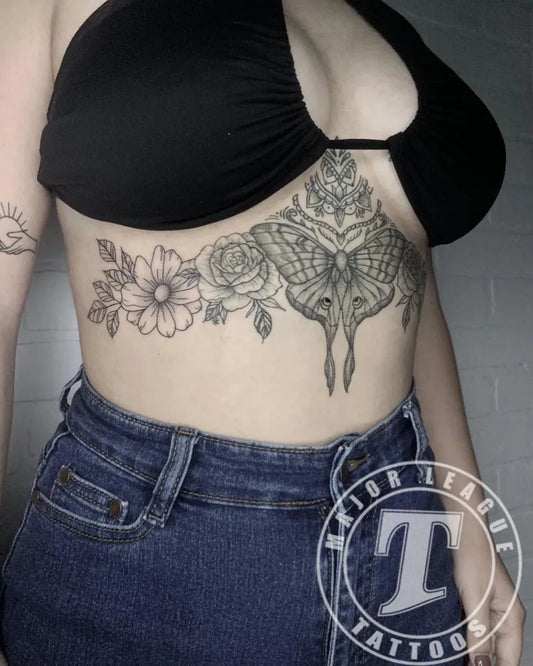 Big Floral Mandala Butterfly on Women Sternum Tattoo by @majorleaguetattoos