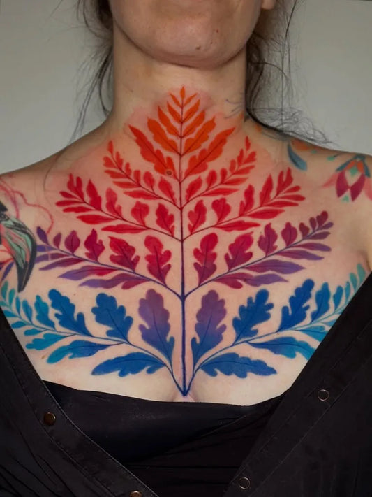 Big Floral Oak Tree Leaves on Women Chest Tattoo by @tattooassist