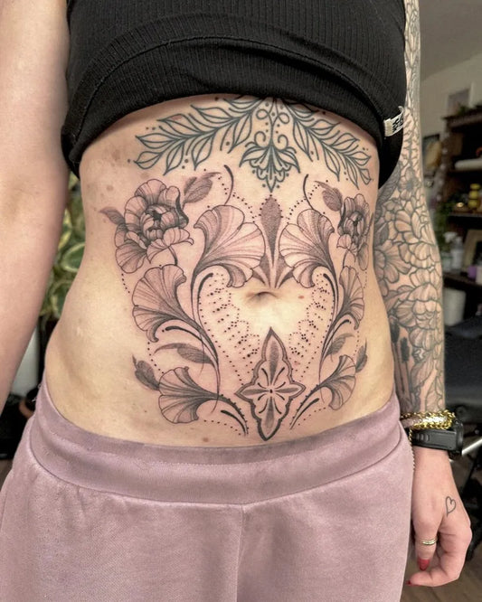 Big Floral Ornamental Tattoo on Women Stomach by @emi1yelizabeth