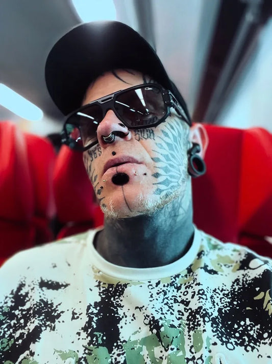 Big Floral Pattern on Men Face Tattoo by @tobi_rotten
