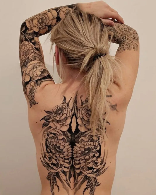 Big Floral Peony Wings on Women Back Tattoo by @tattooassist