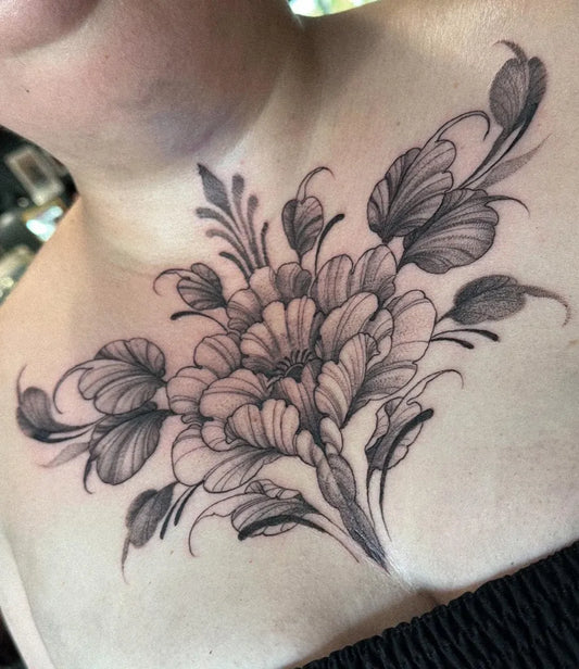 Big Floral Peony with Leaves on Women Sternum Tattoo by @emi1yelizabeth